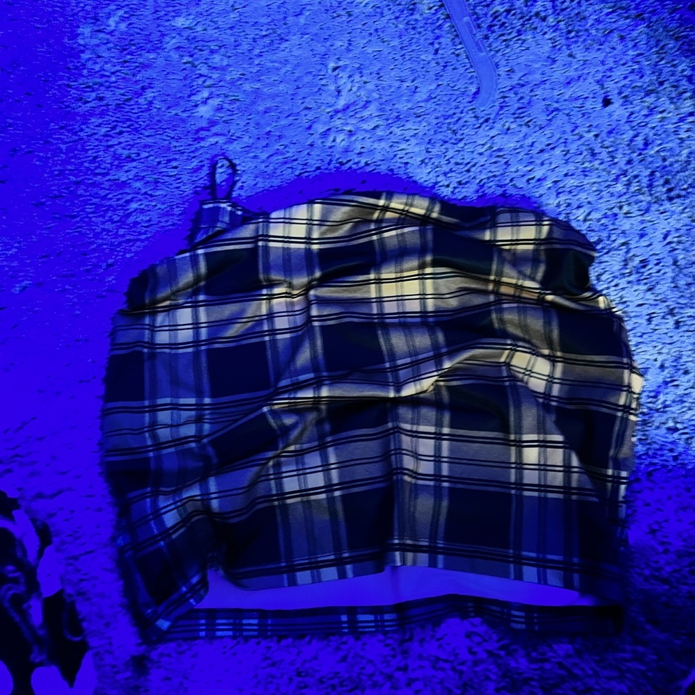 Plaid, black, and yellow  skirt